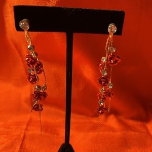 Hanging rose earrings.